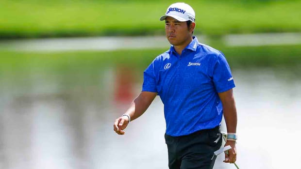Hideki Matsuyama of Japan walks the 18th hole during the first round of the 2024 Arnold Palmer Invitational presented by Mastercard at Bay Hill Golf Course in Orlando, Fla.